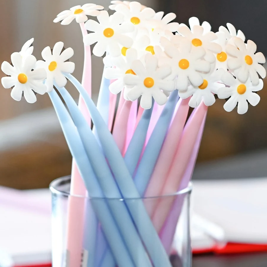 Pastel daisy flower pens in a cup